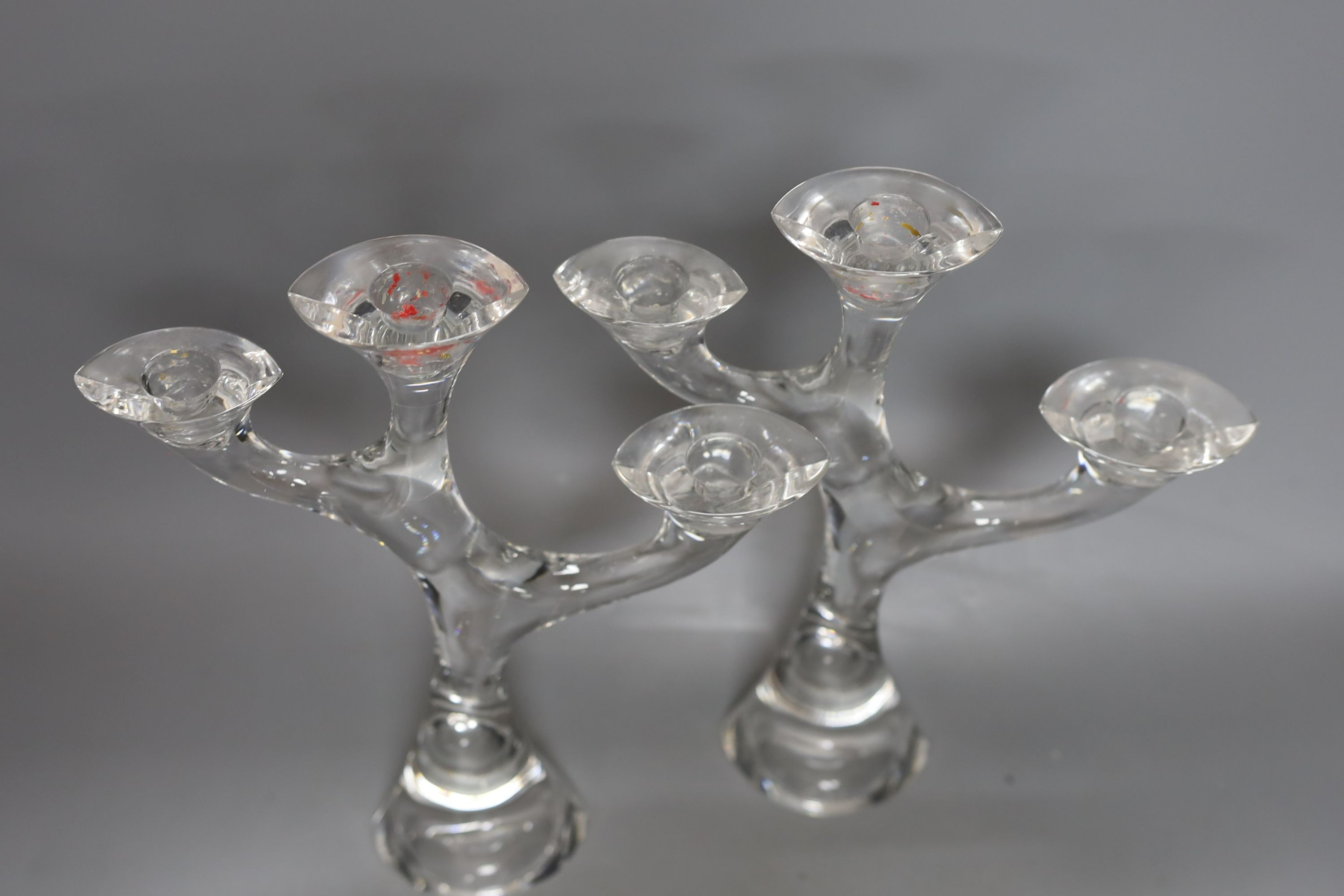 A pair of three branch glass candelabra, signed Marcaurel. 28cm